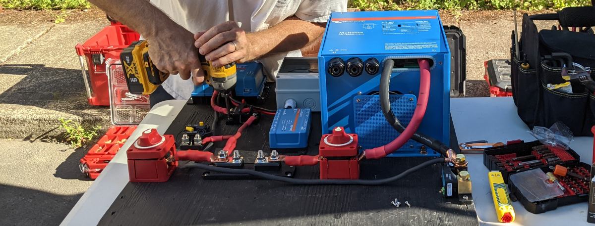 projects header photo, drilling solar components on backboard
